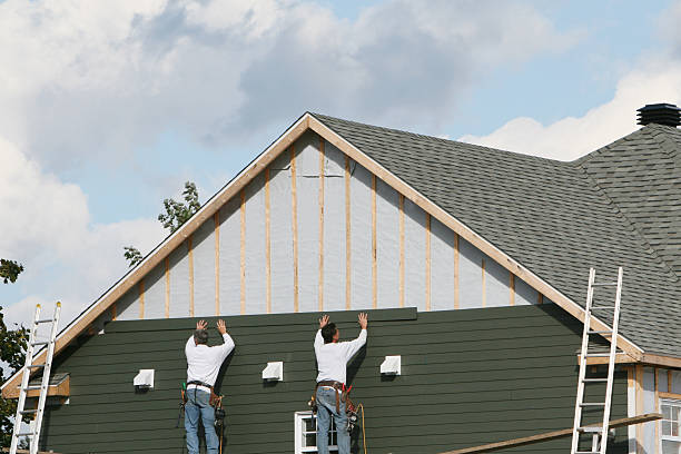 Professional Emergency Siding Repair technician working in Weems, VA